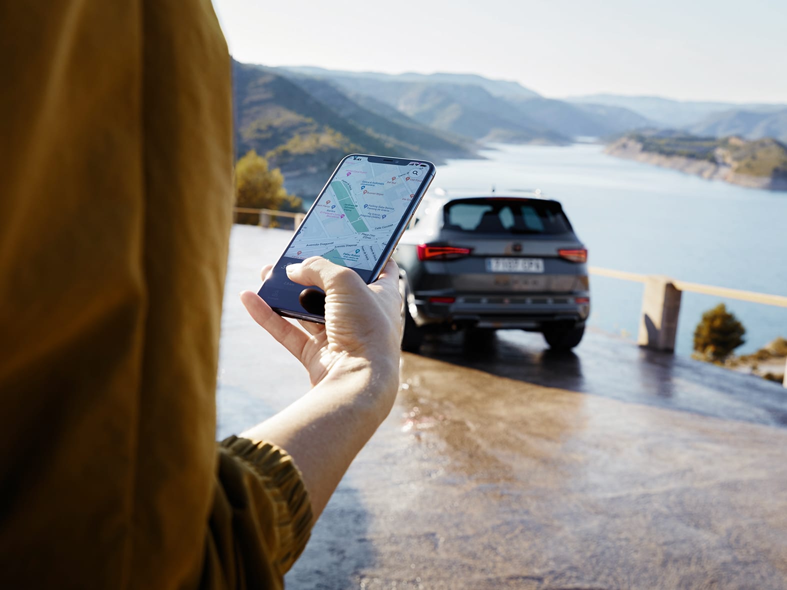 cupra connect app connected through a woman.s smartphone 